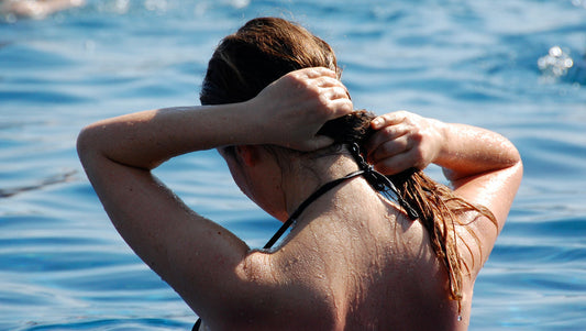 Your Hair’s Worst Summer Enemy? It’s Hiding in Your Pool!